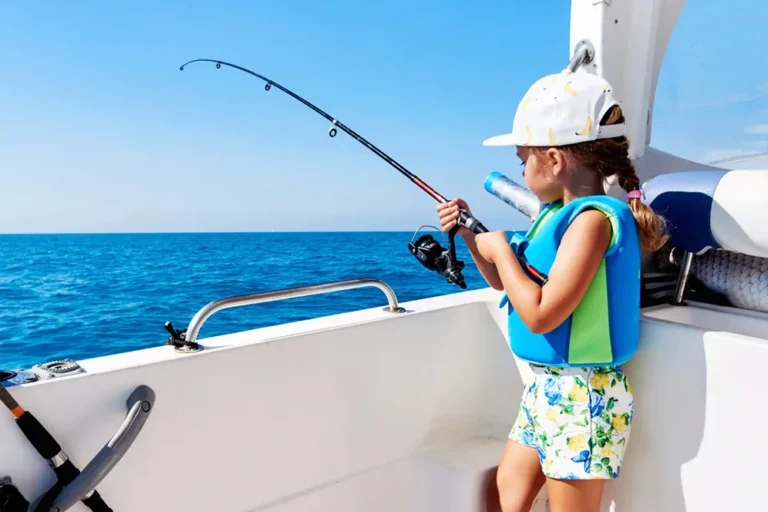 little girl fishing in dubai on a yacht