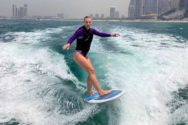 women wakesurfing in dubai